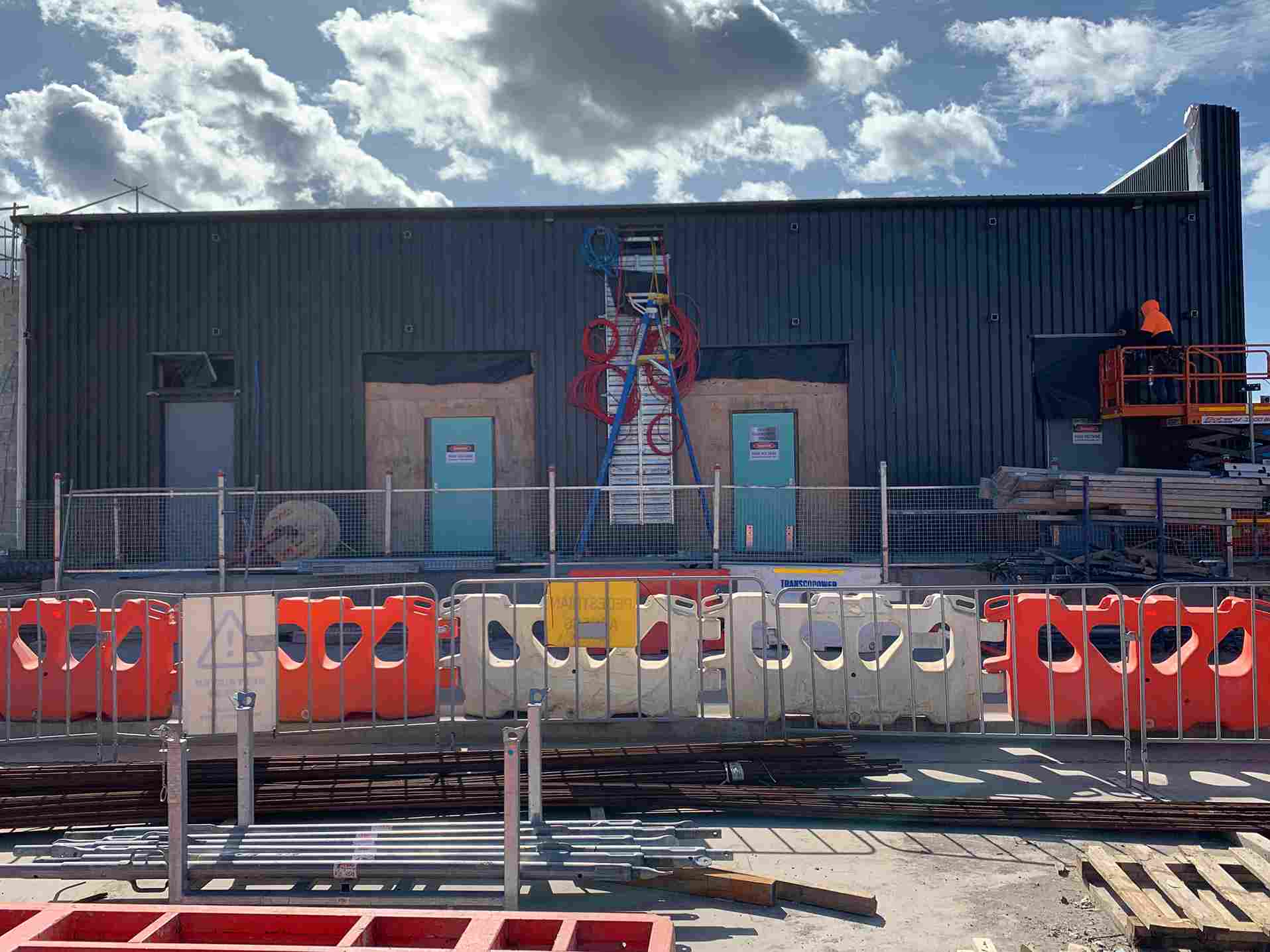 Outrigger Cladding MADE Contracting. Lift Shaft and Escalator Construction for Sydney ...
